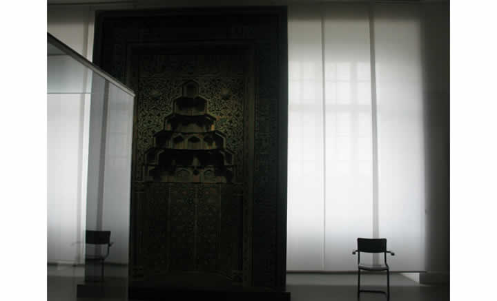 photo of a chair and its reflection in a museum in Paris